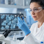 Scientist examining molecular research in a modern laboratory.