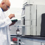 Researcher analyzing Tianeptine samples using laboratory equipment.