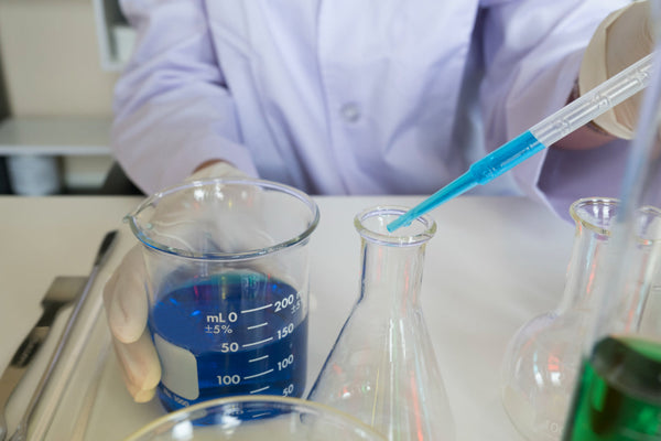 Researcher conducting experiment in laboratory