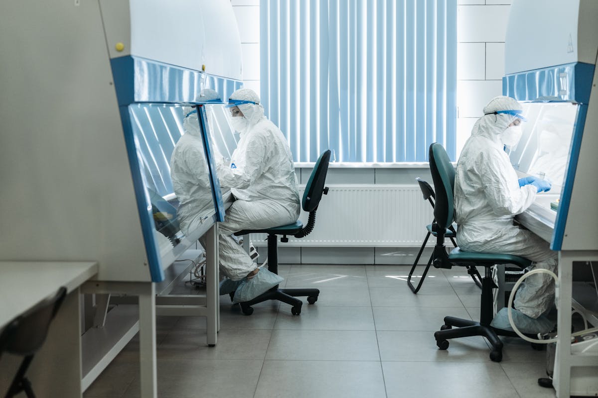 Researchers doing an experiment in the lab