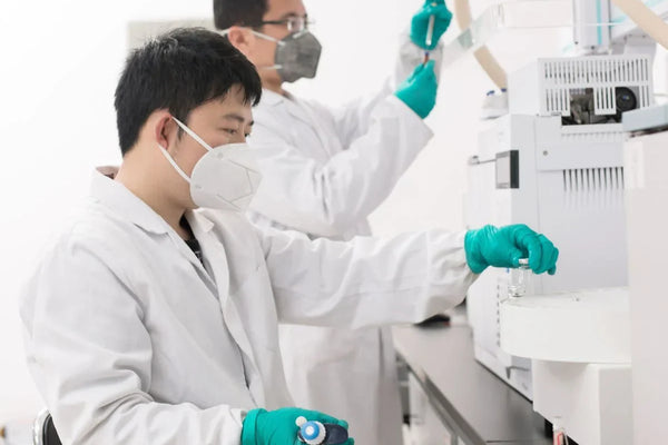 Researcher studying tianeptine in laboratory setting