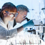 Two scientists documenting findings from Phenibut research.