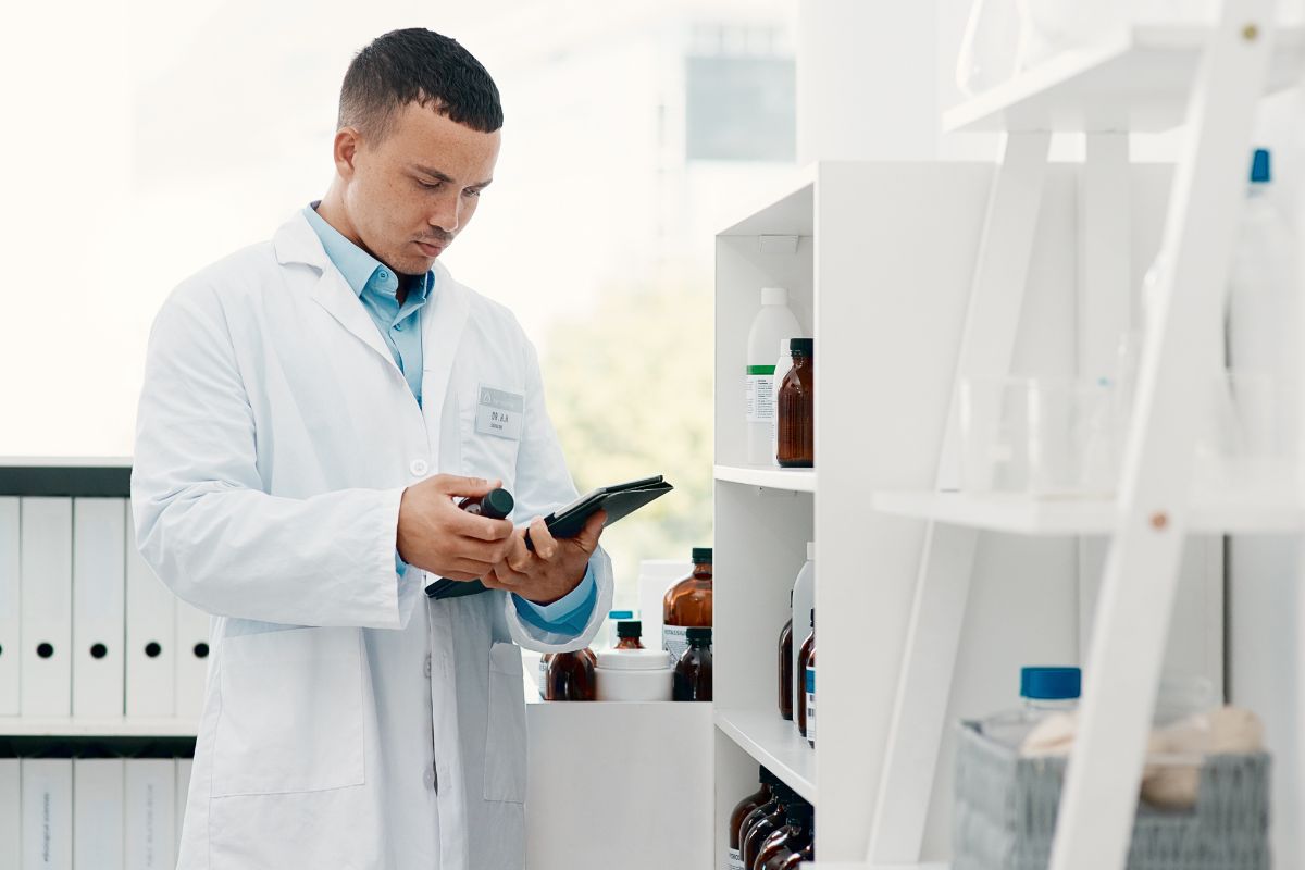 Worker safely storing phenibut in container