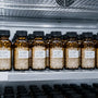 Amber vials of phenibut in controlled lab storage for stability and degradation research