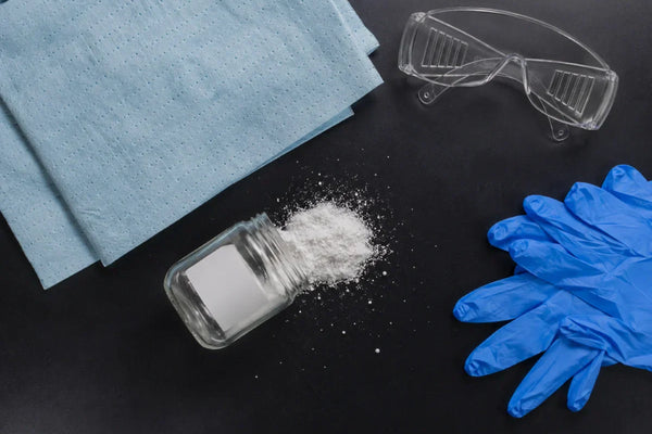 How Should Labs Decontaminate After A Pramiracetam Spill?
