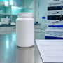 Laboratory bench with sealed pramiracetam container COA document and HPLC vials for research verification 