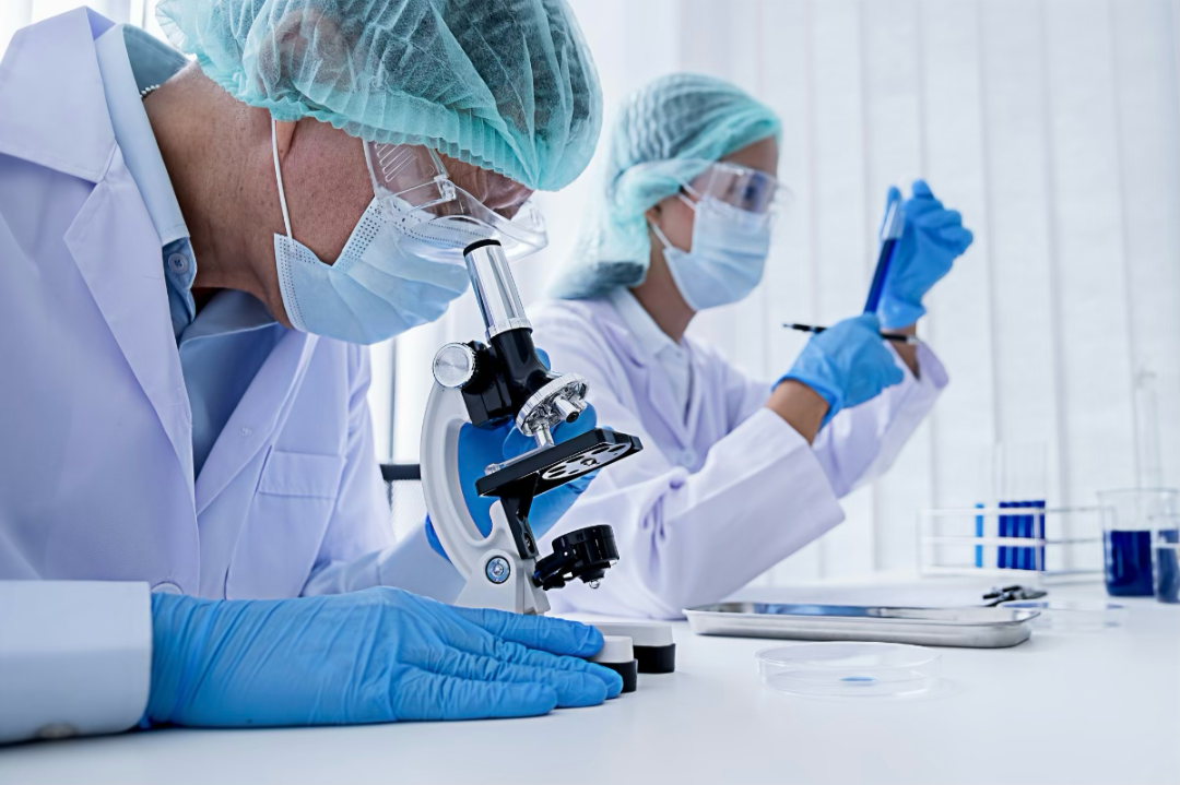 Two people working in a laboratory conducting research
