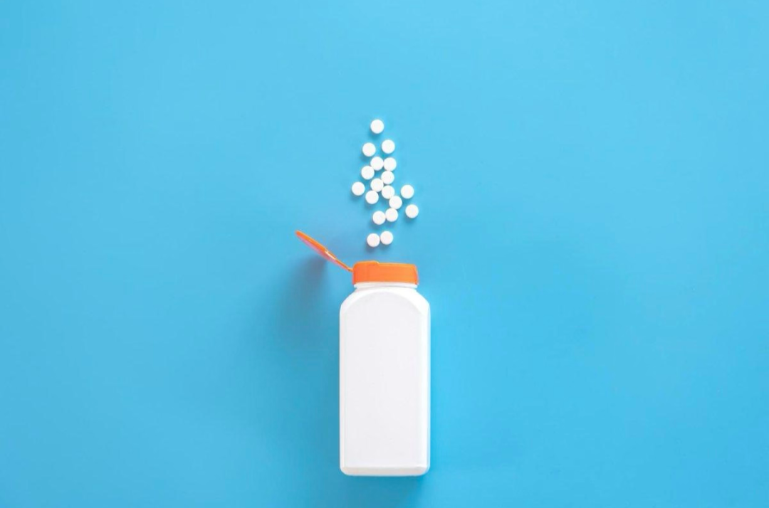 a white bottle containing research compound