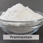 Bowl of white pramiracetam powder with a simple label on a lab bench