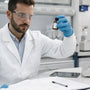 Scientist handling and documenting Agomelatine in laboratory
