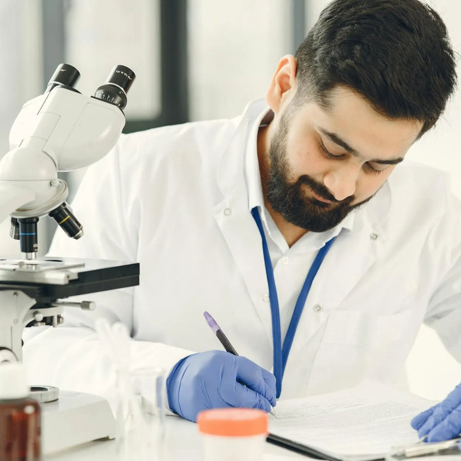 a lab person writing the conclusion on tianeptine research