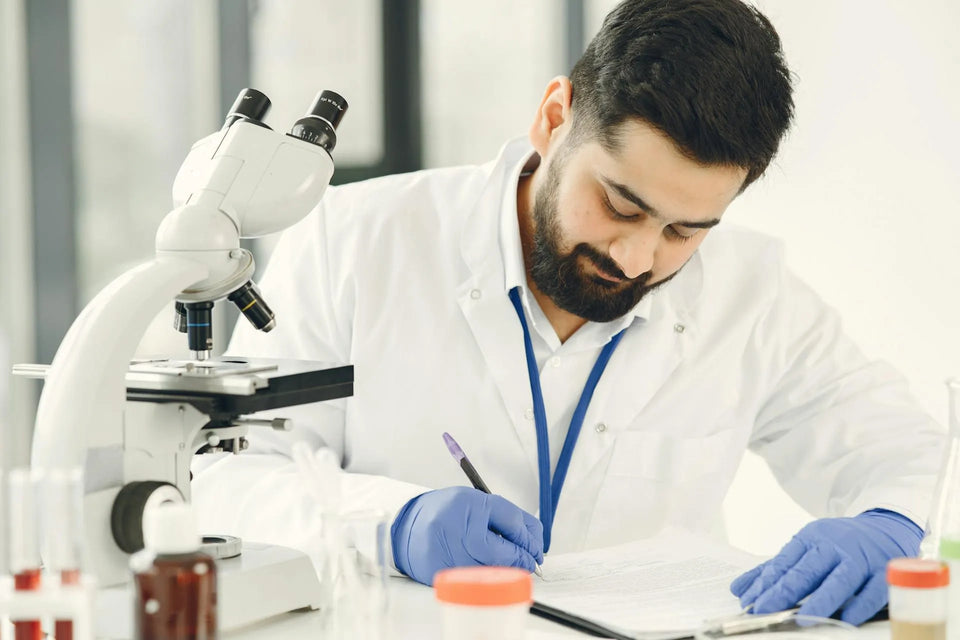 a lab person writing the conclusion on tianeptine research