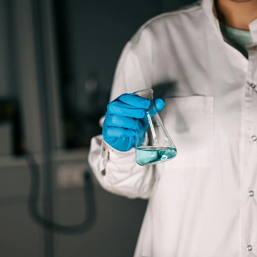 a person holding research tube