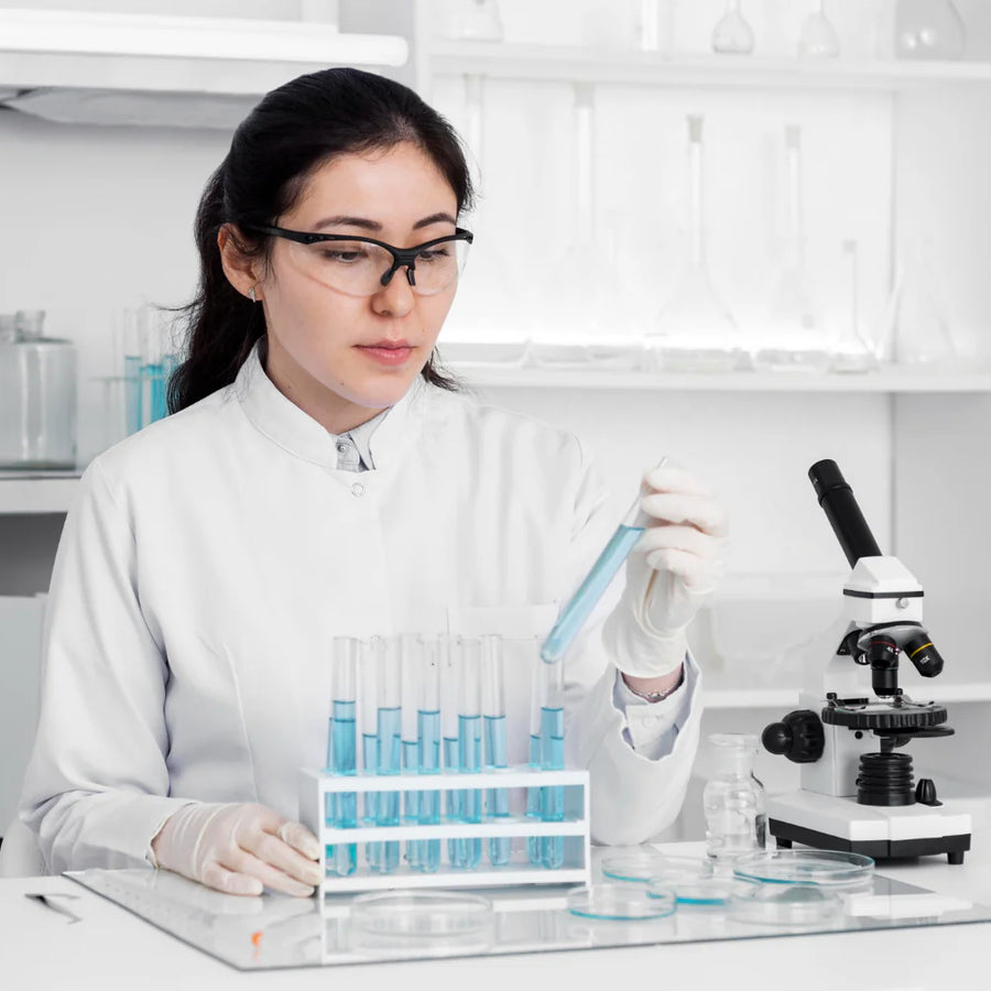 Woman in lab doing experiments