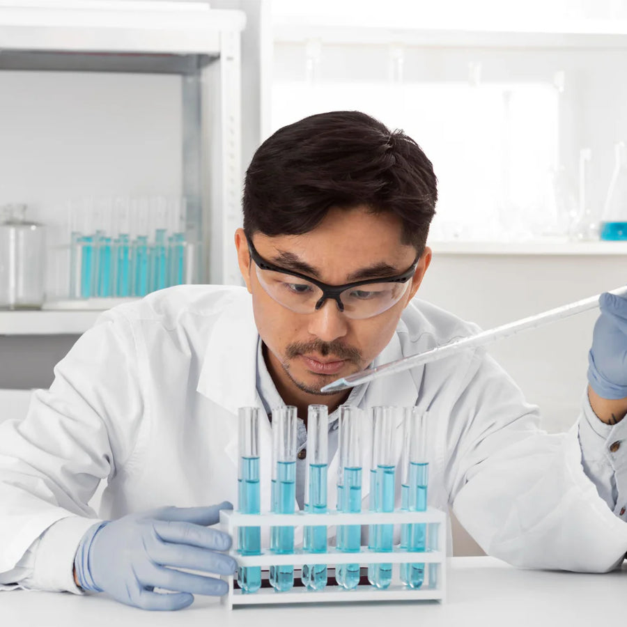 Man in lab doing experiments
