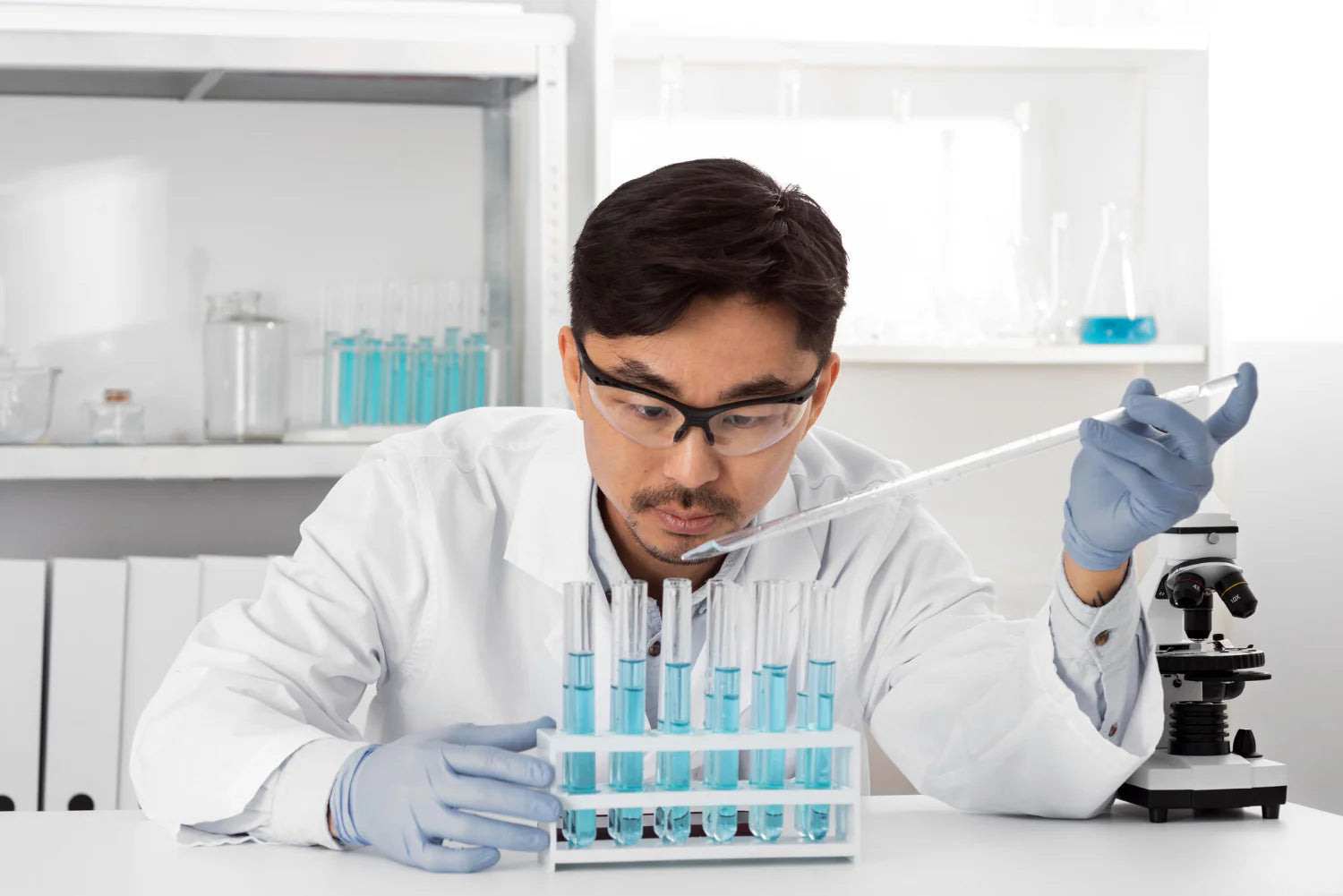 Man in lab doing experiments