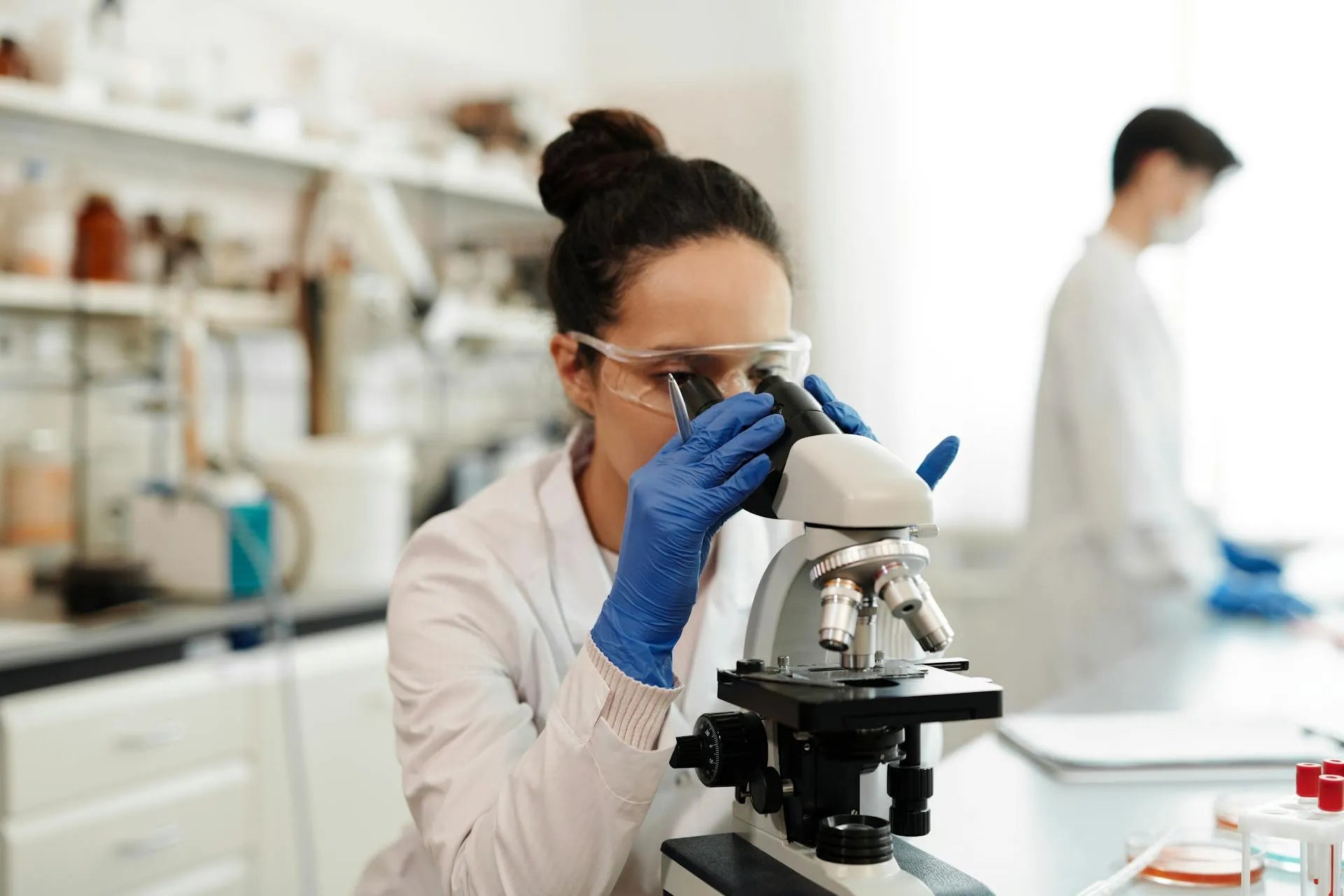 researcher using microscope for tianeptine research