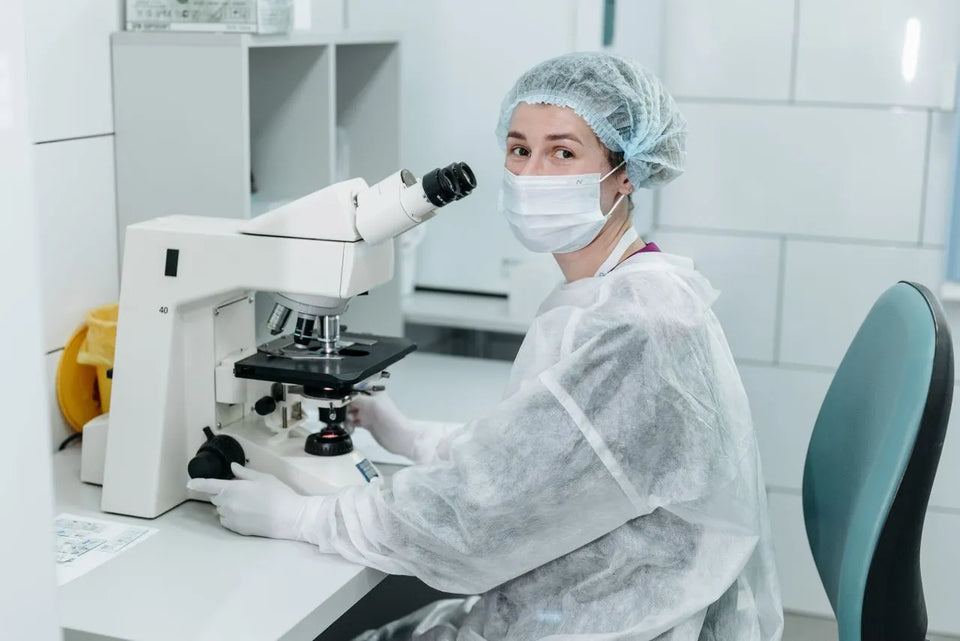 scientist using laboratory equipment